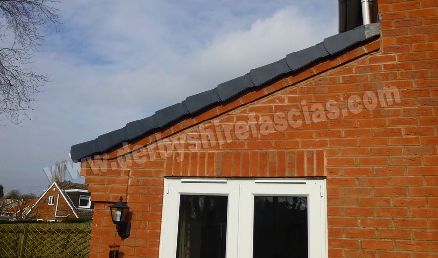 UK house gable end with dry verge system