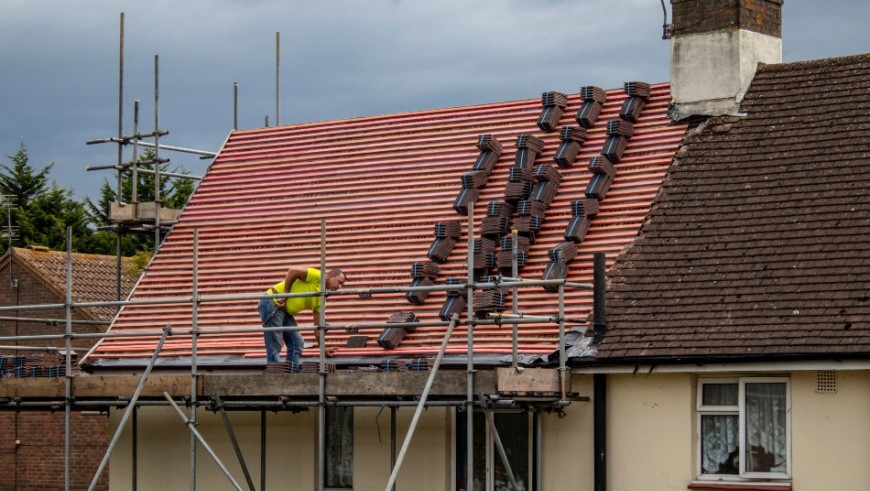 Emergency roof repairs on British house