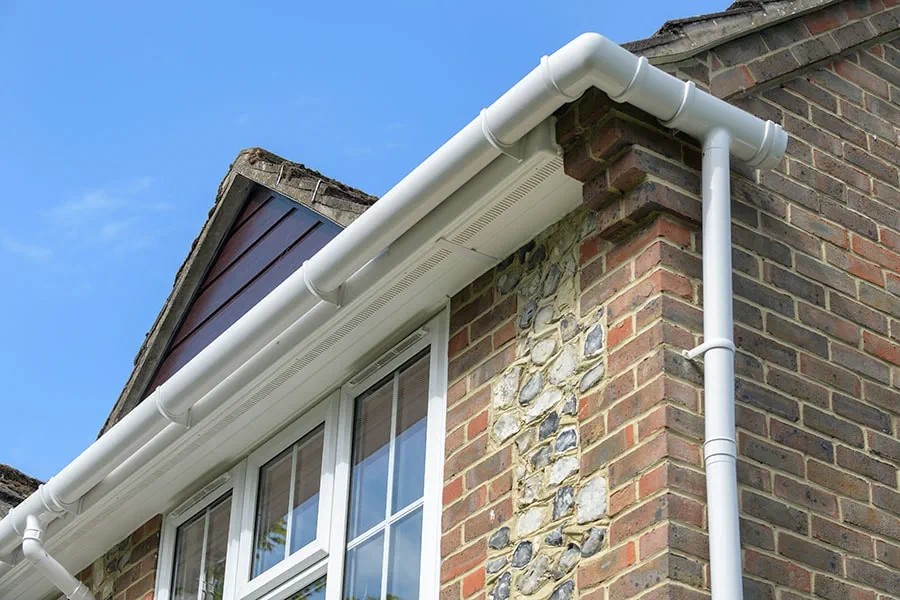 UK house with white UPVC fascias and guttering